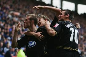 Brett Ormerod celebrates scoring for Latics at Leicester in April, 2005 with Jimmy Bullard and Lee McCulloch