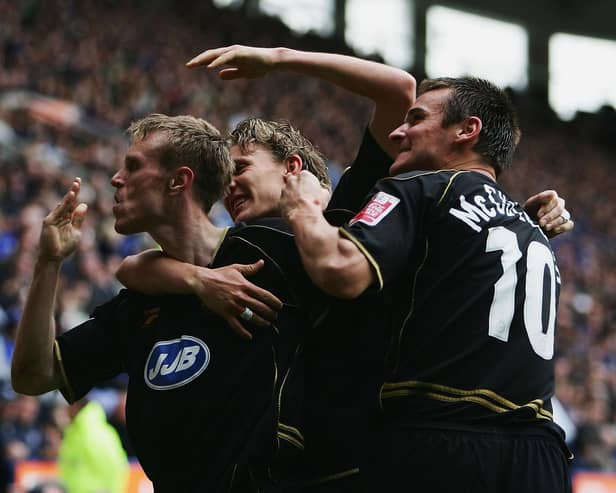 Brett Ormerod celebrates scoring for Latics at Leicester in April, 2005 with Jimmy Bullard and Lee McCulloch