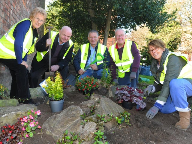 Swinley Residents Group were joined by volunteers, members of the community and local councillors to transform an area of Swinley, Wigan, part of The Deal, from left, Janice Powell (secretary of Swinley Residents Group), Coun Michael McLoughlin, Coun Lawrence Hunt, Coun George Davies and Sheila Livesey (chair of Swinley Residents Group).
