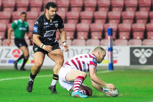 Liam Marshall claimed Wigan's second try of the evening, after Salford failed to deal with a Thomas Leuluai kick.