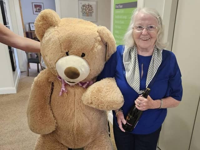 Belong Atherton's Dorothy prepares for Name the Bear competition with Yogi