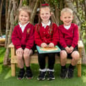 Pupils on the new bench at St William’s Catholic Primary School in Ince