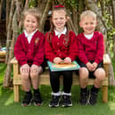 Pupils on the new bench at St William’s Catholic Primary School in Ince