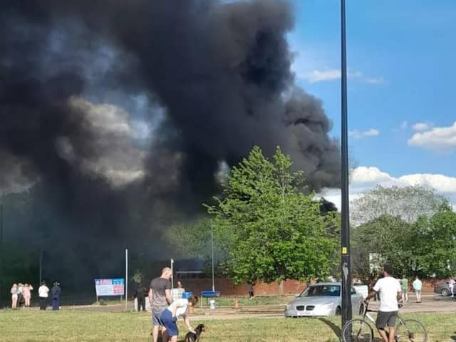 Smoke fills the sky over Templeton Road South, Platt Bridge