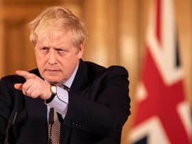 Prime Minister Boris Johnson gives a press conference on the ongoing situation with the coronavirus pandemic with chief medical officer Chris Whitty and Chief scientific officer Sir Patrick Vallance in Downing Street after he had taken part in the government's COBRA meeting on March 16 (Photo: Richard Pohle - WPA Pool/Getty Images)