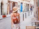 Seeing the sights on foot can help to cut your carbon footprint when travelling (photo: Adobe)