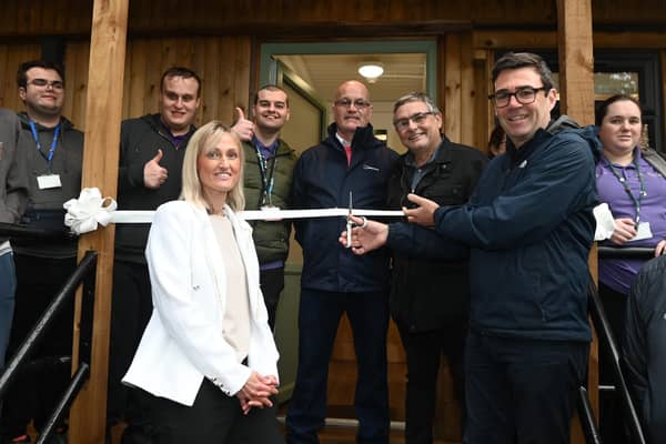 The Mayor of Greater Manchester Andy Burnham cuts the ribbon to officially open the new building.