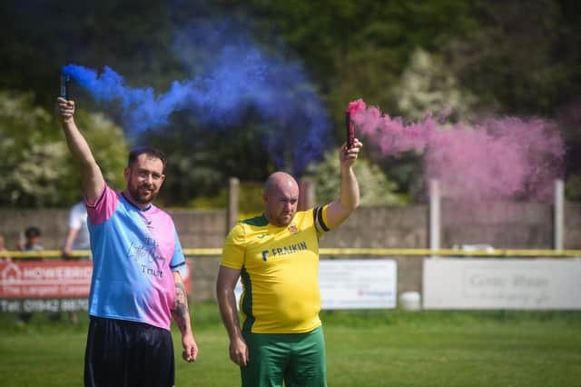 Shaun Mitchell and Mark Prince lit flares in memory of their children