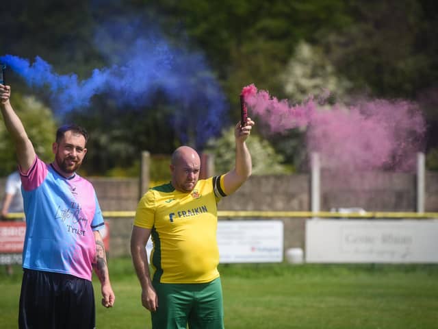 Shaun Mitchell and Mark Prince lit flares in memory of their children
