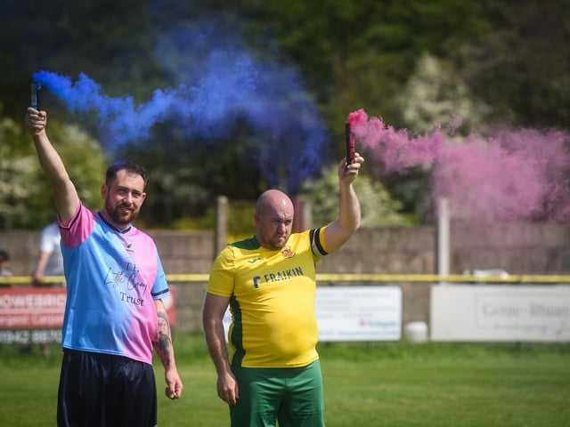 Shaun Mitchell and Mark Prince lit flares in memory of their children