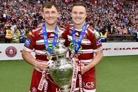 Harry Smith and Jai Field with the Challenge Cup trophy at Wembley