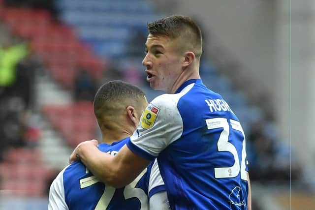 Charlie Hughes congratulates Ashley Fletcher for his goal against Birmingham