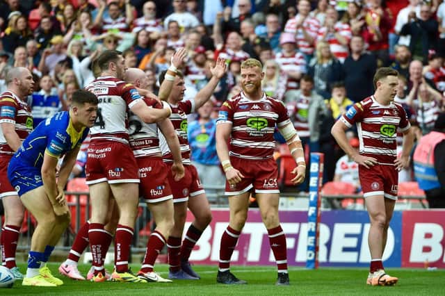 Skipper Liam Farrell's try seals Wigan's victory over Warrington in the Challenge Cup final