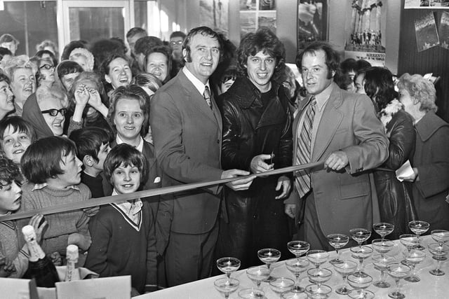 Top musician Georgie Fame, who was born and grew up in Leigh, opens a holiday travel business with owners, Gordon McKend and Graham Crompton, at the travel bureau in Scholes on Tuesday November 28th 1972.