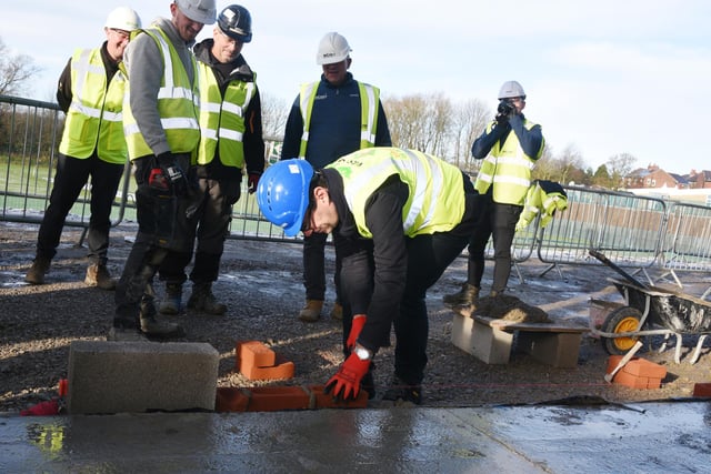 The Mayor of Greater Manchester Andy Burnham laid a brick in the new building.