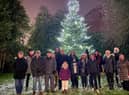 People came together at the Christmas tree on Wigan Lane, Swinley