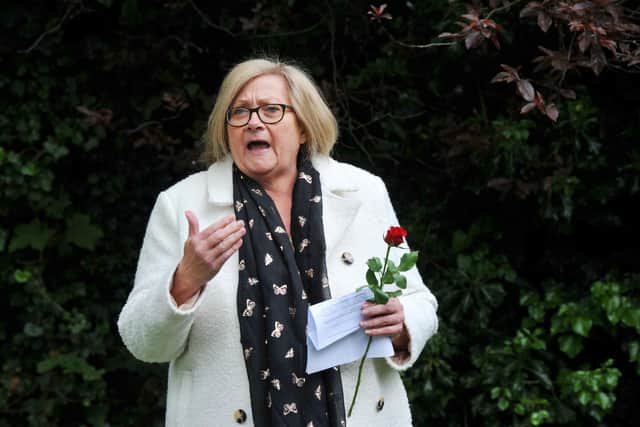 Coun Mary Callaghan, pictured at an event for Workers' Memorial Day last year, spoke about her experience of domestic abuse during the council meeting
