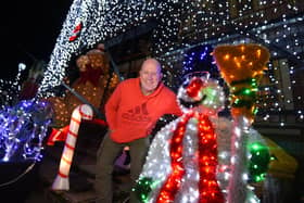 Paul Molyneux at last year's annual Christmas light display which covers the house and garden of the Molyneux's home on Shevington Lane, Shevington, raising funds for Wigan Infirmary's Rainbow Ward, where their children were treated a few years ago.