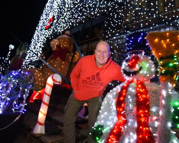 Paul Molyneux at last year's annual Christmas light display which covers the house and garden of the Molyneux's home on Shevington Lane, Shevington, raising funds for Wigan Infirmary's Rainbow Ward, where their children were treated a few years ago.