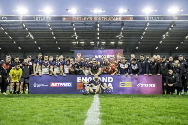 England celebrate after victory over Tonga