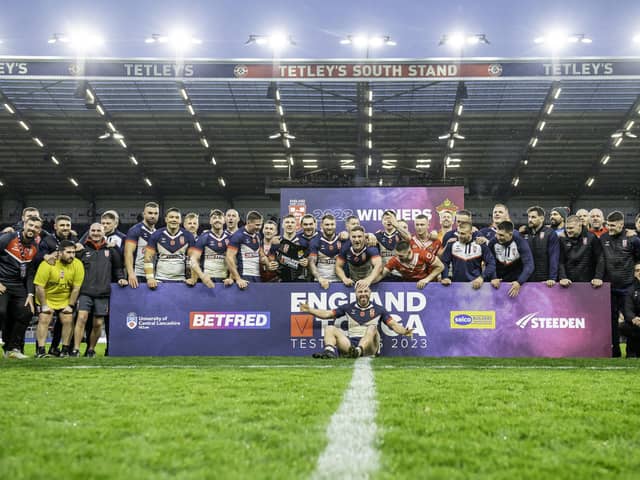 England celebrate after victory over Tonga