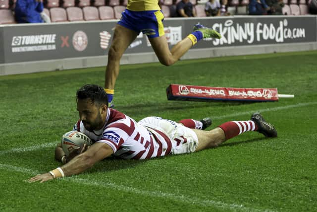 Wigan Warriors take on Warrington Wolves at the DW Stadium