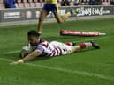 Wigan Warriors take on Warrington Wolves at the DW Stadium