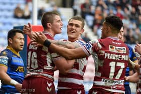 Wigan forward Ethan Havard celebrates with team-mates