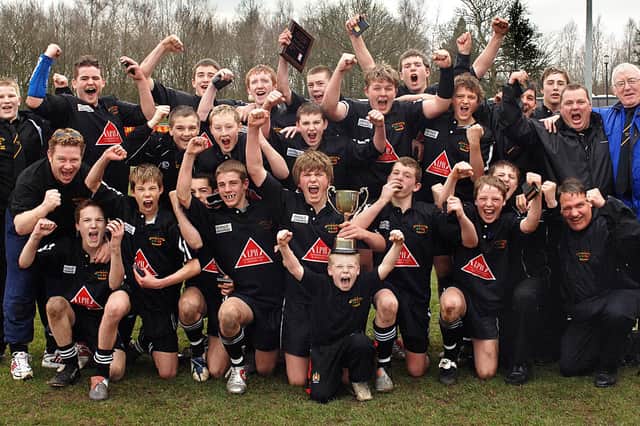 The Wigan St. Pats team celebrate winning the BARLA National Under 14s Cup Final after beating Blackbrook 18-16 after extra time at Sedgley Park, Bury, on Sunday 20th March 2005.