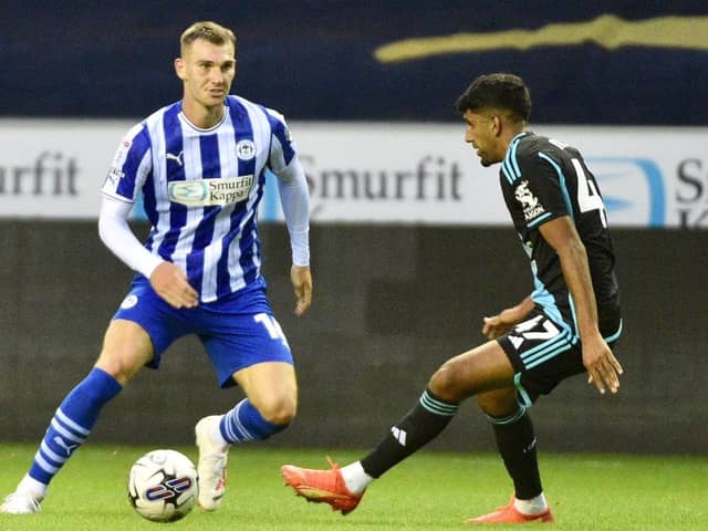 Liam Shaw is pushing for a league start after making a fine debut for Latics against Leicester City Under-21s in midweek