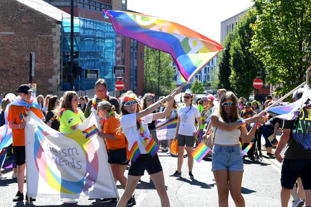 People are invited to dress in shades of pink and blue, inspired by the transgender flag