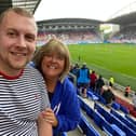 James Whyte, pictured with mum Sarah, are both keen Wigan Athletic fans