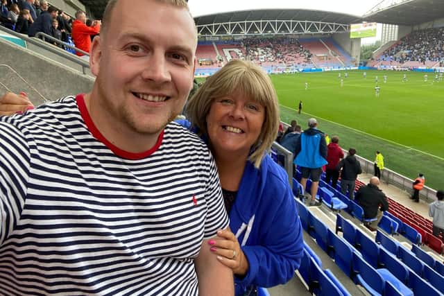 James Whyte, pictured with mum Sarah, are both keen Wigan Athletic fans