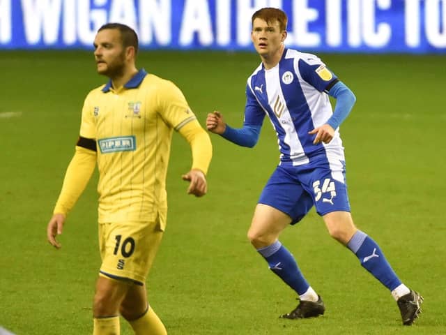 Luke Robinson in action for Latics