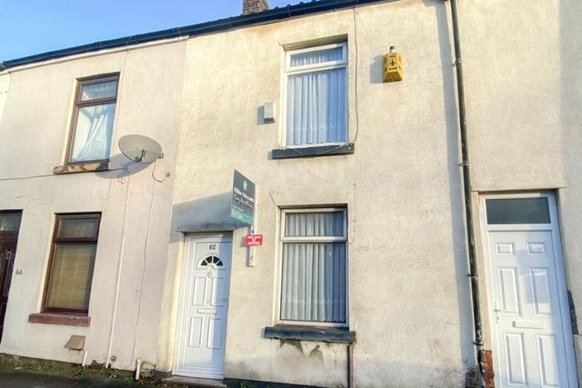 Guide Price £65,000. Two bedroom mid terrace property briefly comprising of; entrance hallway, lounge and a spacious rear dining room, fitted kitchen including oven, hob and extractor. For sale by conditional online auction.