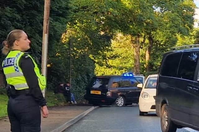 The damaged Range Rover on Spring Road