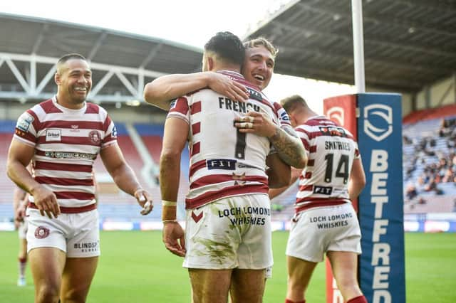 Bevan French celebrates with his teammates