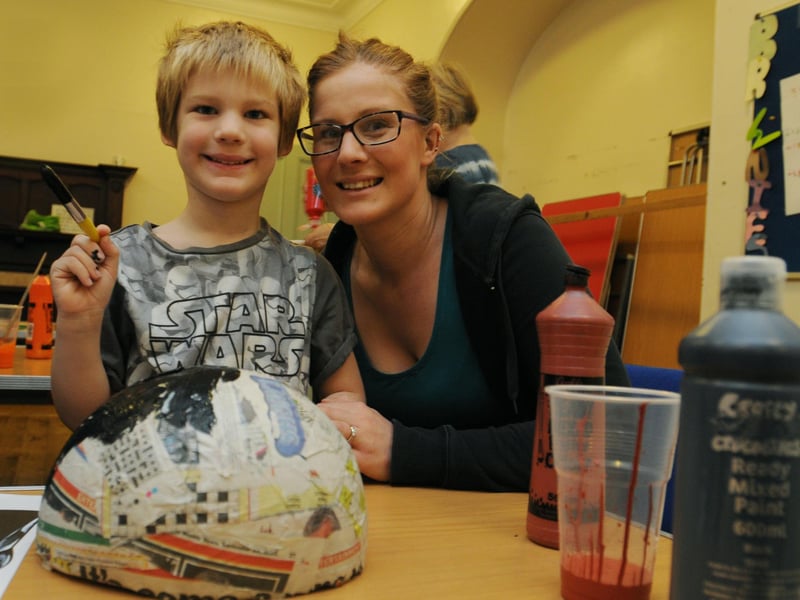 Children and families make Star Wars-themed crafts, lanterns and masks, part of half-term craft workshop at Christ Church Pennington, Leigh.