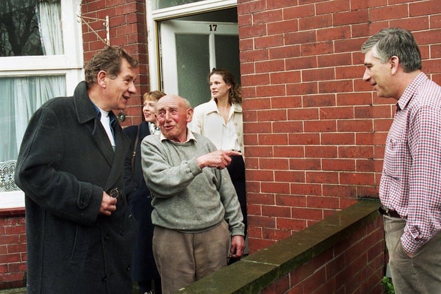 Actor Ian McKellen is seen chatting to neighbours during a visit on Thursday April 18 1996 to the house where he lived when young in Parson's Walk, Wigan, opposite Mesnes Park and backing onto Wigan Cricket Club ground. He also popped over the road to the park to bring back further memories
