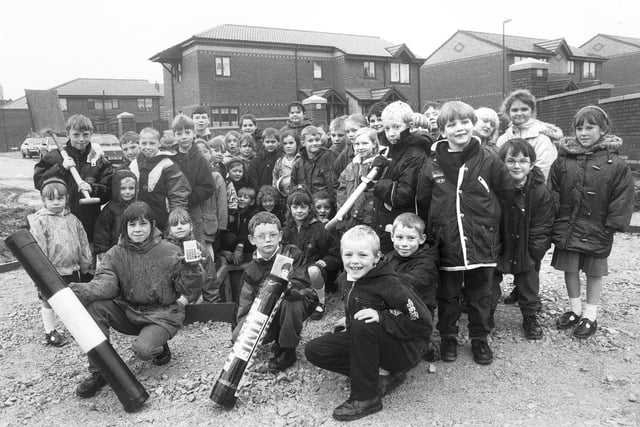 RETRO 1995 - St Catharine and St Patrick's junior school pupils bury time capsules in Scholes 1995