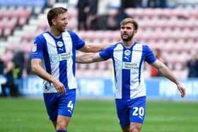 Will Aimson and Callum McManaman celebrate safety being secured on Easter Monday