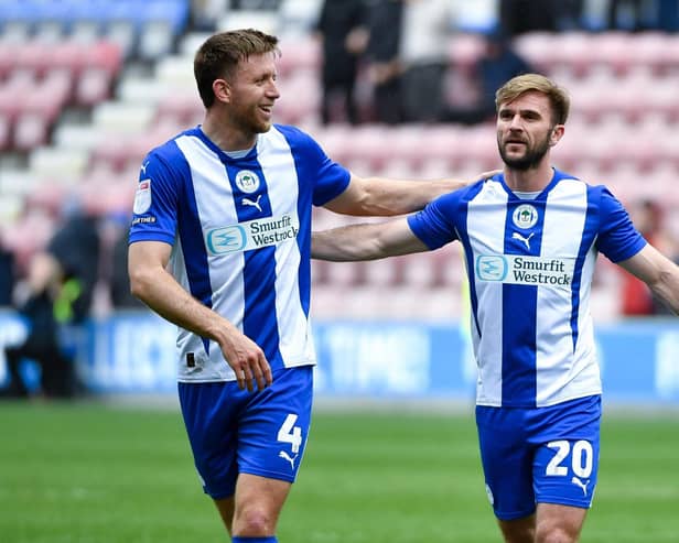 Will Aimson and Callum McManaman celebrate safety being secured on Easter Monday