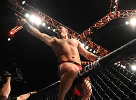 Tom Aspinall celebrates his big win in London
