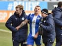 Max Power leaves the field against Wimbledon