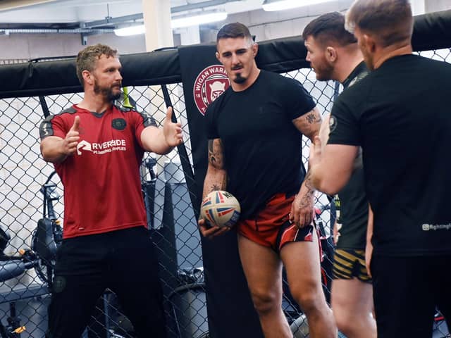 Wigan Warriors players have a training session with UFC heavyweight Tom Aspinall and other members of Fighting for Fitness