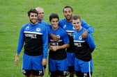 Jordi Gomez, Stephen Crainey, Danny Redmond, James Perch and Callum McManaman have a laugh together during training ahead of the away game at Zulte Waregem in 2013