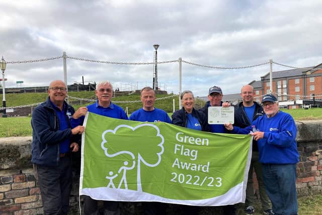 Photos show Canal & River Trust volunteer leader Neil Holladay (second right) with enthusiastic volunteers from the Leeds & Liverpool Canal - delighted to be awarded a coveted Green Flag and heritage award for a new 35-mile canal length from Liverpool to Wigan.