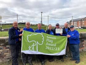 Photos show Canal & River Trust volunteer leader Neil Holladay (second right) with enthusiastic volunteers from the Leeds & Liverpool Canal - delighted to be awarded a coveted Green Flag and heritage award for a new 35-mile canal length from Liverpool to Wigan.