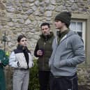 Fred Kettle on set at Emmerdale with his co-stars. Photo: ITV