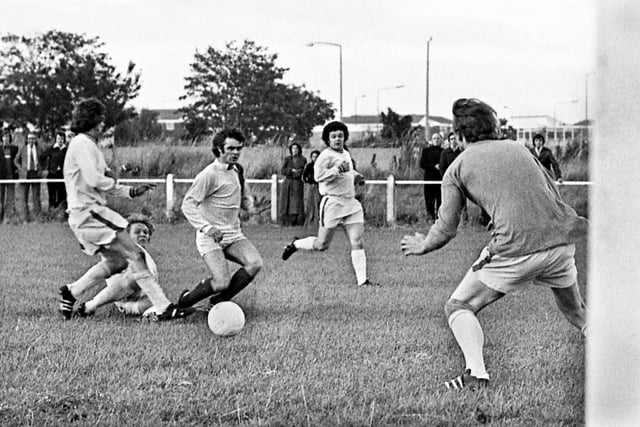 Wigan Athletic winger, Mickey Worswick, trips on the well grassed pitch at White Moss Park during the Northern Premier League match against Skelmersdale United on Saturday 23rd of August 1975.  Latics won 2-1 with goals from John Rogers and Mickey Worswick.